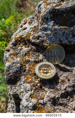 Compass Abandoned On The Rocks