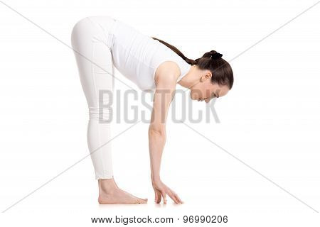 Yogi Female Standing In Uttanasana Pose