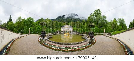 Panorama Of The Linderhof Palace. Fountain Group Flora And Puttos