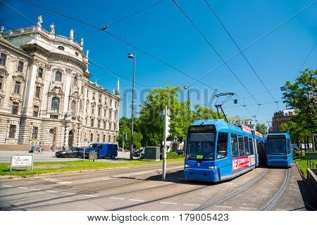 Tram 28 And 27 On The Karlsplatz Stachus, Munich, Germany.