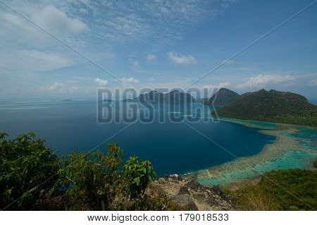 Beautiful tropical Bohey Dulang island with beach and blue water for relax