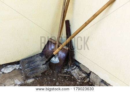 Grunge Wall Background At The Mill, Shovel Near The Wall
