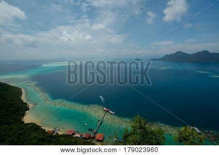 Beautiful tropical Bohey Dulang island with beach and blue water for relax
