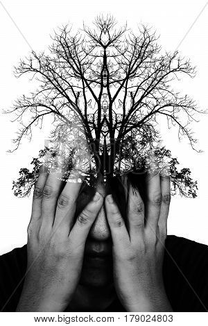 double exposure photo of stressful man with silhouette of tree branch on white