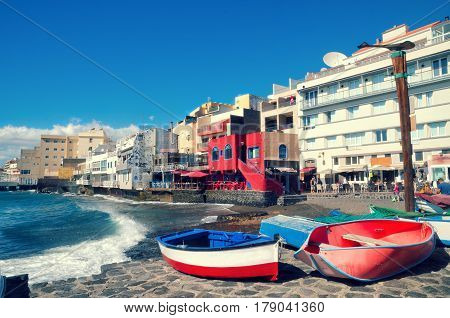 Beautiful View Of El Medano, Little Town In The South Of Tenerife. Red Wooden Fishing Boats On The B
