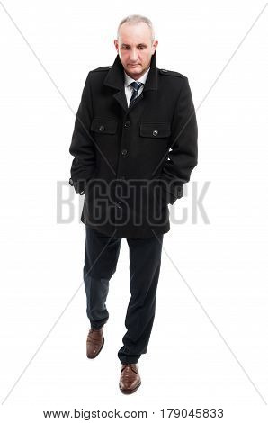 Full Body Of Middle Age Business Man Walking Wearing Overcoat