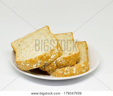 Slice Of Breads On The White Disc Isolate Background