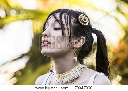 CAGLIARI, ITALY - June 1, 2014: Sunday at La Grande Jatte public gardens - portrait of a beautiful girl in cosplay costume - Sardinia