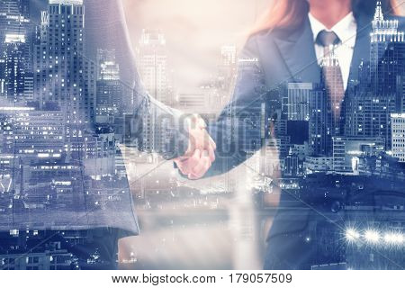 Double Exposure Businesswoman shaking hand for business successfulBusiness Concept
