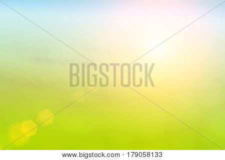 white fluffy clouds in the blue sky abstract background .Natural background blurring .warm colors and bright sun light.glitter celebration .sunny view beautiful concept .sunshine glow,blurred nature,warm weather,art blur, colorful pattern sets, bokeh effe