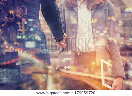 Double Exposure Businesswoman shaking hand for business successfulBusiness Concept