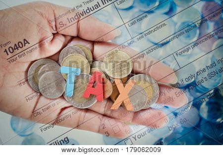 Double Exposure US tax form 1040 with dollar. tax form law document usa mathematics business concept