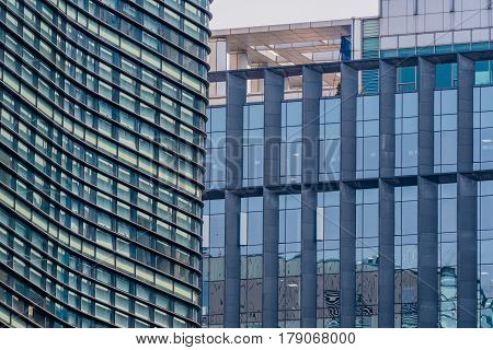 Tall highrise office building with glass exteriors in downtown Seoul South Korea
