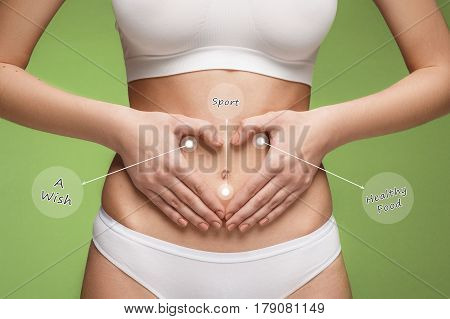 Women belly with the drawing arrows. The cellulite removal plan. White markings on young woman body preparing for plastic surgery. Concept of slimming, liposuction, strand lifting