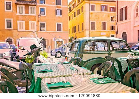 Scenic view from the terrace of a cafe on streets of Trastevere in Rome