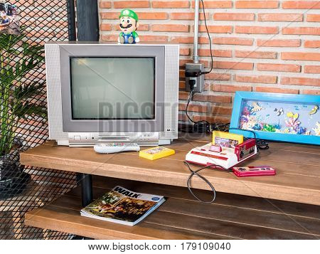 Chonburi Thailand - March 25 2017: Nintendo family computer the video game console for home or portable gaming.