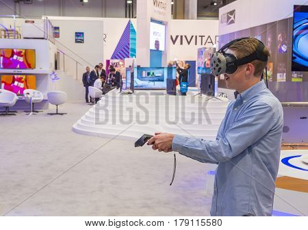 LAS VEGAS - JAN 08 : Virtual reality demonstration at The Vivitar booth at the CES show in Las Vegas on January 08 2017 CES is the world's leading consumer-electronics show.