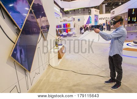 LAS VEGAS - JAN 08 : Virtual reality demonstration at The Vivitar booth at the CES show in Las Vegas on January 08 2017 CES is the world's leading consumer-electronics show.