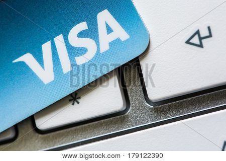 Benon, France - Feb 08, 2017: Visa Credit Card On The Keyboard, Close Up Photo