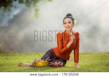 Asian woman Beautiful girl in Laos costume.