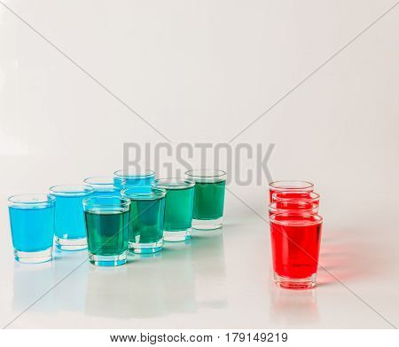 Glasses With Blue, Green And Red Kamikaze, Glamorous Drinks, Mixed Drink Poured Into Shot Glasses