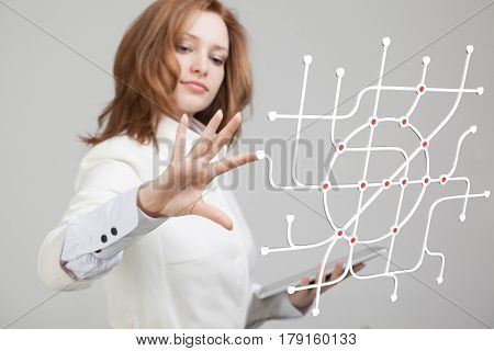 Woman specialist and urban planner working with the interactive subway map.