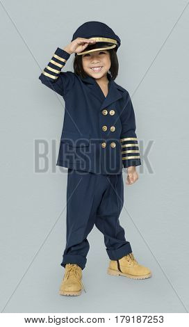 Little Boy in Pilot Costume Studio Portrait