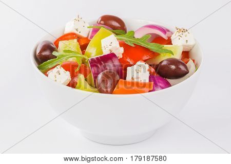 Fresh vegetable salad isolated on a white