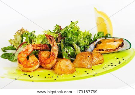Seafood salad close-up on a white background