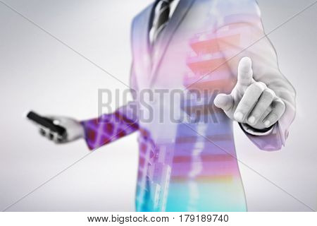 Midsection of businessman using futuristic digital screen against modern buildings against sky 3d
