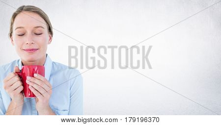 Digital composite of Woman with red mug against white wall