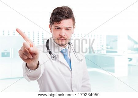 Serious Doctor Doing Refusal Gesture