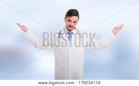 Handsome Medic With Palms Up