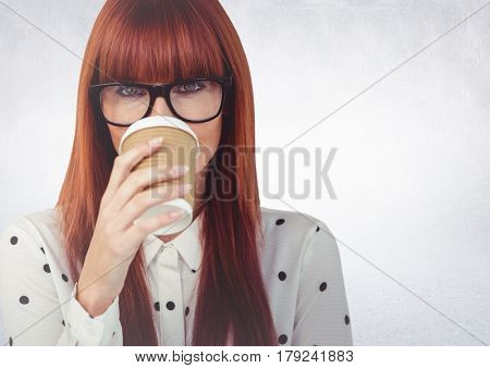 Digital composite of Close up of woman with coffee cup over face against white wall