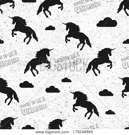 Unicorn wallpaper. Seamless pattern in swatch. Vector illustration. Born to be a unicorn. Repeating background. Jumping unicorns and clouds. Grunge vintage texture. Fabric textile print.