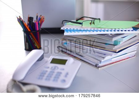 Group Of Multicolored Office Folders And Glasses