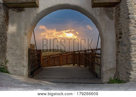 Sunset see thru gate at Deva fortress