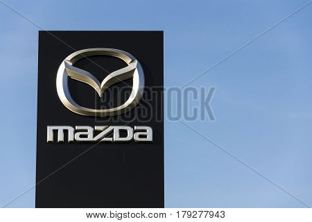 Prague, Czech Republic - March 31: Mazda Car Company Logo In Front Of Dealership Building On March 3