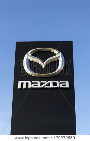 Prague, Czech Republic - March 31: Mazda Car Company Logo In Front Of Dealership Building On March 3
