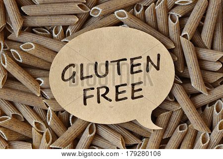 Texture background of raw gluten-free pasta - maco