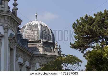 Elements Of The Castle Of Festetics Against The Blue Sky In The Town Of Keszthely. Hungary. It's Bar