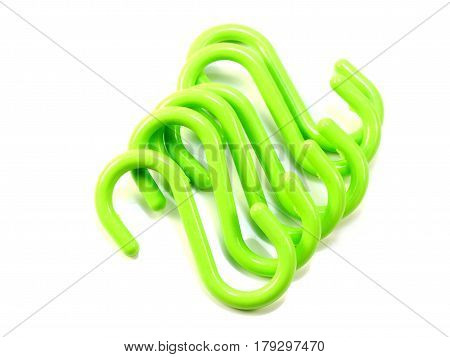 green s-shape hooks isolated on white background