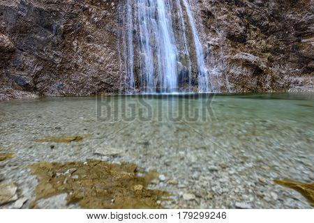 the high Nixenfall Waterfall in the Austrian Alps