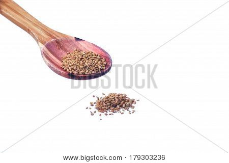 Fenugreek Seeds On A Brass Spoon Isolated On A White Background.