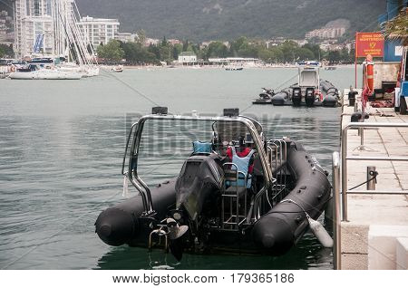 Motor boat at the sea pier of the old town