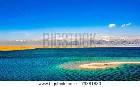 Beautiful Sailimu Lake in Xinjiang, China it's a fault basin at an elevation of 2,073 meters, the highest among the Xinjiang high mountain lakes and with a maximum depth of 86 meters.
