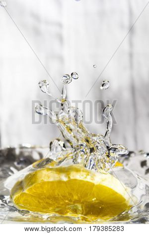 a piece of lemon fallen in water suddenly