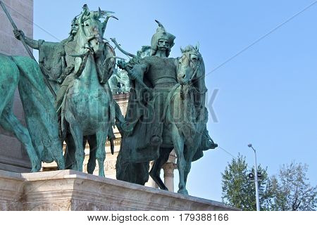 BUDAPEST, HUNGARY - AUGUST 08, 2012: Millennium Monument on the Heroes' Square. Side view of several of the seven statues of the Seven chieftains of the Magyars.