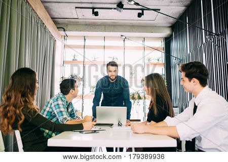 Business People Having Board Meeting In Modern Office. Teamwork