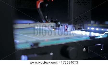 Three dimensional printing machine. 3D printer during work